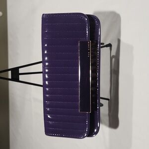 Ted Baker Patent Clutch Magnetic Closure